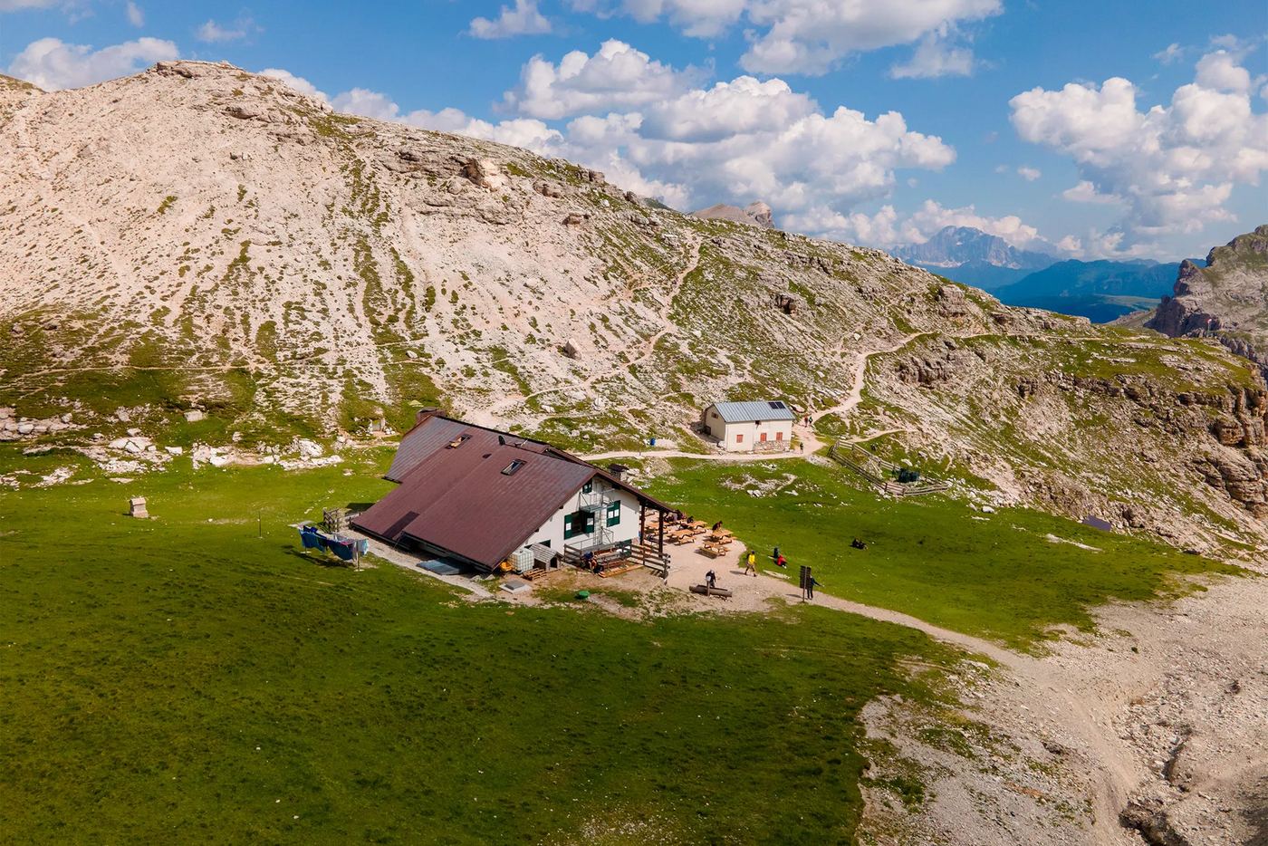 Puez refuge at 2,500 m on the arid Puez plateau — difficult traverse from Selva Val Gardena